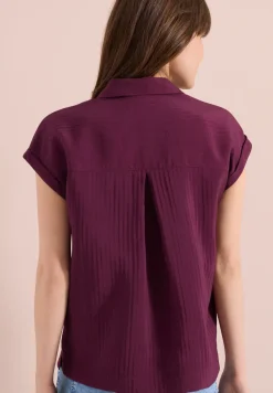Blouse met hangende schouder en structuur