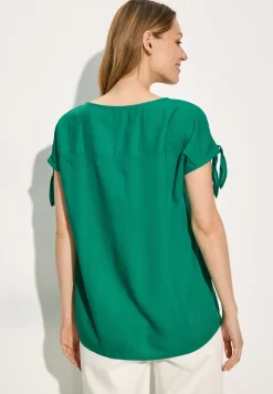 Blouse met knoopdetail