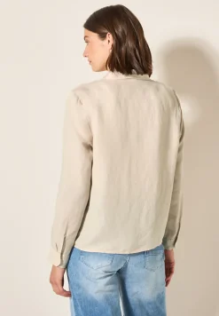 Blouse met knoop in de zoom