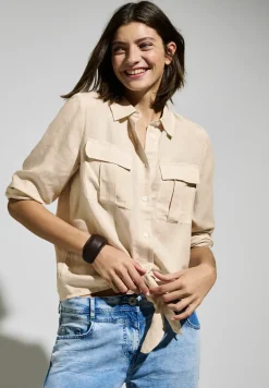 Blouse met knoop in de zoom