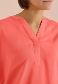 Blouse met korte mouwen en gespleten hals