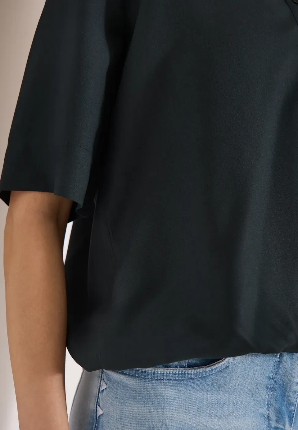 Blouse met korte mouwen en gespleten hals