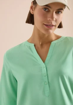 Blouse met korte mouwen en gespleten hals