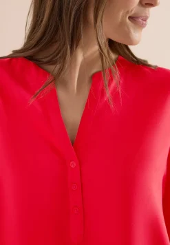 Blouse met korte mouwen en gespleten hals