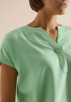 Blouse met korte mouwen en gespleten hals