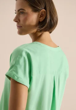 Blouse met korte mouwen en gespleten hals