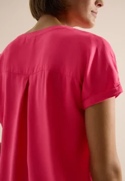 Blouse met korte mouwen en gespleten hals
