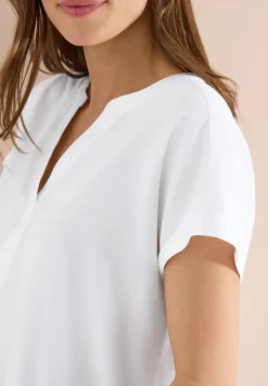 Blouse met korte mouwen en gespleten hals