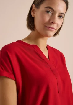Blouse met korte mouwen en gespleten hals