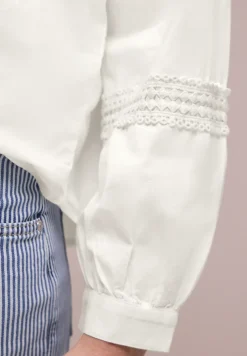 Blouse met lange mouwen en gehaakte details