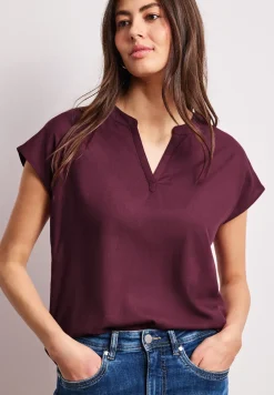 Blouse met losse schouders en gespleten hals