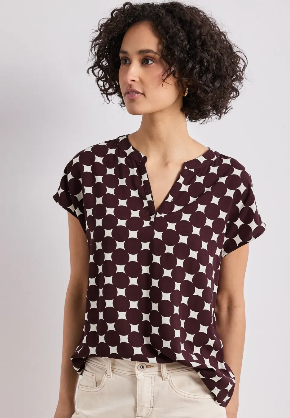 Blouse met losse schouders en gespleten hals