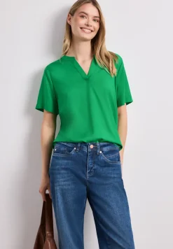 Blouse met losse schouders en gespleten hals