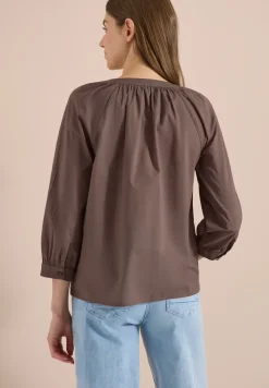 Blouse met 3/4 mouwen en gespleten hals in effen kleur
