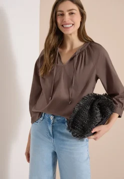 Blouse met 3/4 mouwen en gespleten hals in effen kleur