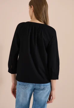 Blouse met 3/4 mouwen en gespleten hals in effen kleur