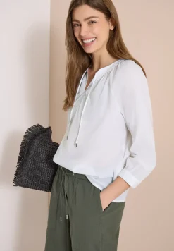 Blouse met 3/4 mouwen en gespleten hals in effen kleur