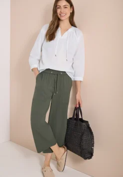 Blouse met 3/4 mouwen en gespleten hals in effen kleur
