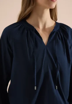 Blouse met 3/4 mouwen en gespleten hals in effen kleur