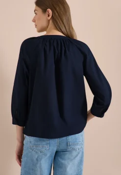 Blouse met 3/4 mouwen en gespleten hals in effen kleur