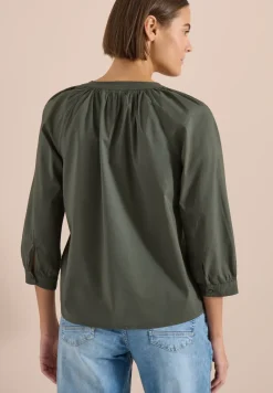 Blouse met 3/4 mouwen en gespleten hals in effen kleur