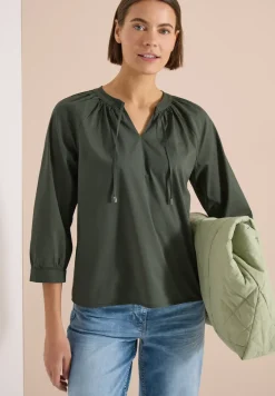 Blouse met 3/4 mouwen en gespleten hals in effen kleur