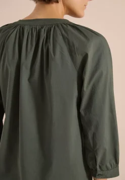 Blouse met 3/4 mouwen en gespleten hals in effen kleur
