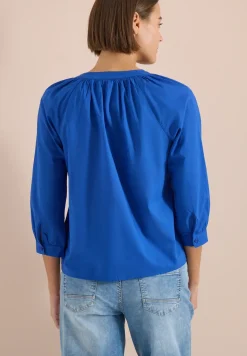 Blouse met 3/4 mouwen en gespleten hals in effen kleur