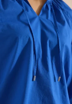 Blouse met 3/4 mouwen en gespleten hals in effen kleur