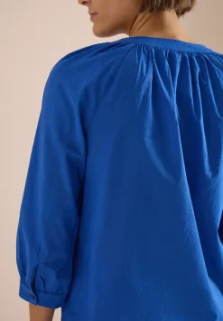 Blouse met 3/4 mouwen en gespleten hals in effen kleur