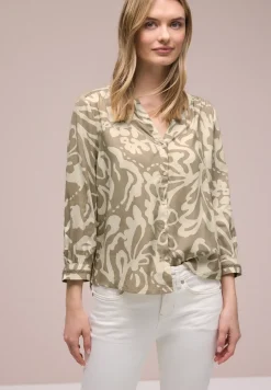 Blouse met 3/4 mouwen en getapete details