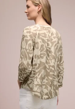 Blouse met 3/4 mouwen en getapete details