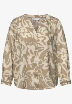 Blouse met 3/4 mouwen en getapete details
