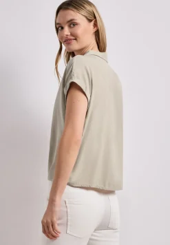 Blouse met overhangende schouders en bowlingkraag