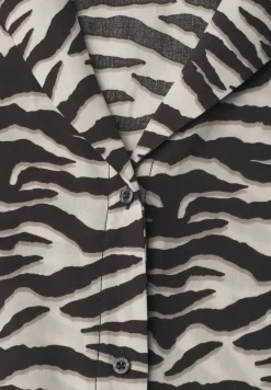Blouse met overhangende schouders en bowlingkraag