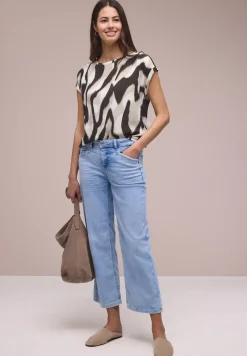 Blouse met overhangende schouders en getapete details