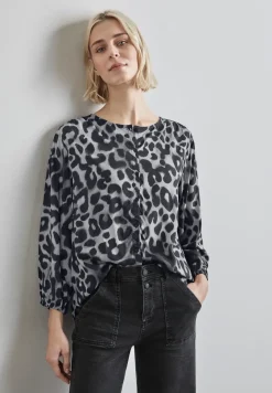Blouse met plooien