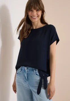 Blouse met ronde hals en knoopdetail