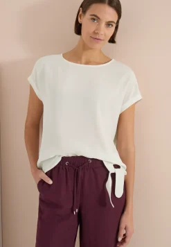 Blouse met ronde hals en knoopdetail