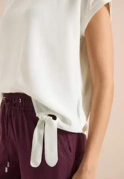 Blouse met ronde hals en knoopdetail
