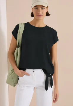 Blouse met ronde hals en knoopdetail