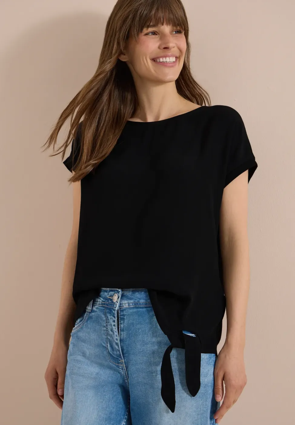 Blouse met ronde hals en knoopdetail