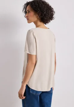 Blouse met ronde hals en korte pofmouwen