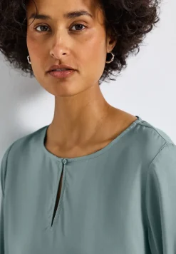 Blouse met ronde hals en uitsnijding