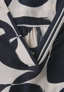 Blouse met tape details