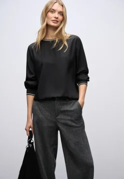 Blouse met tape details