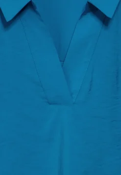 Blouse met tricot mouwen