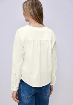 Blouse met V-hals en borduursel