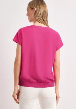 Blouseshirt met gespleten hals en smokdetail