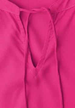 Blouseshirt met gespleten hals en smokdetail
